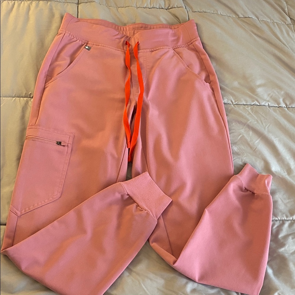 FIGS Pink Zamora Jogger Scrub Pants with accent red drawstring